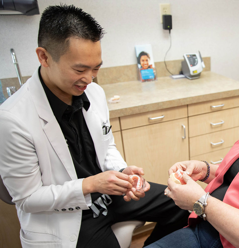Dr. hua explaining full mouth reconstruction teratment